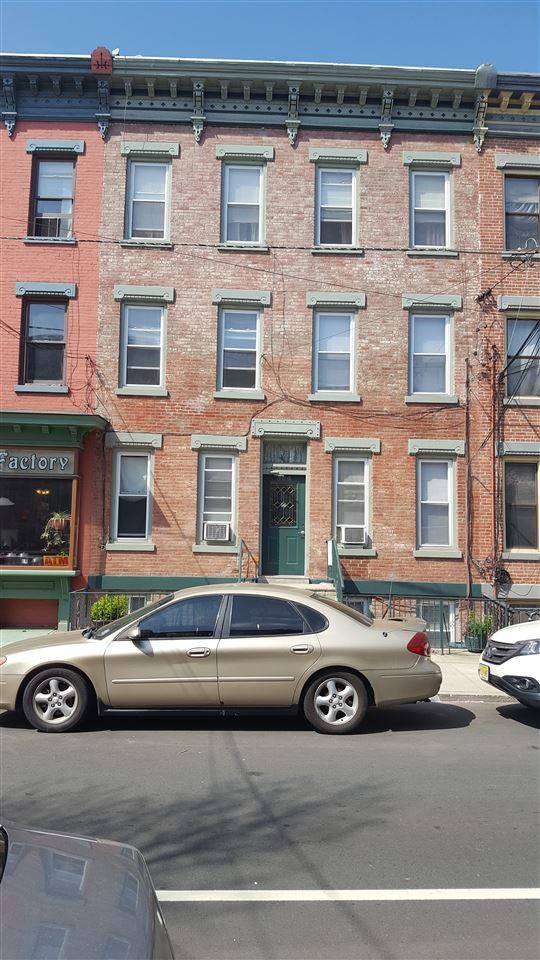 Solid 6 family Brick Building investment located just 3 blocks from Hamilton Park