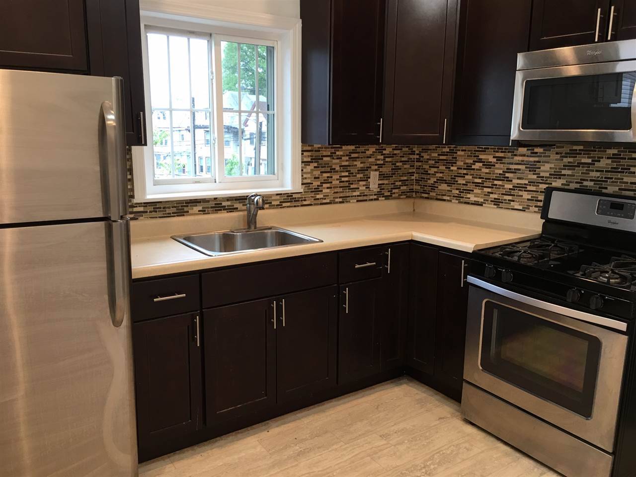 Spacious 2 bed 1 bath with bonus office beautifully renovated in Jersey City's bustling Journal Square neighborhood