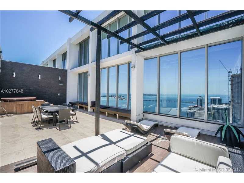 Spectacular two - story penthouse located in ICON BRICKELL offering an oversized private balcony with Jaccuzi to enjoy panoramic views of the bay