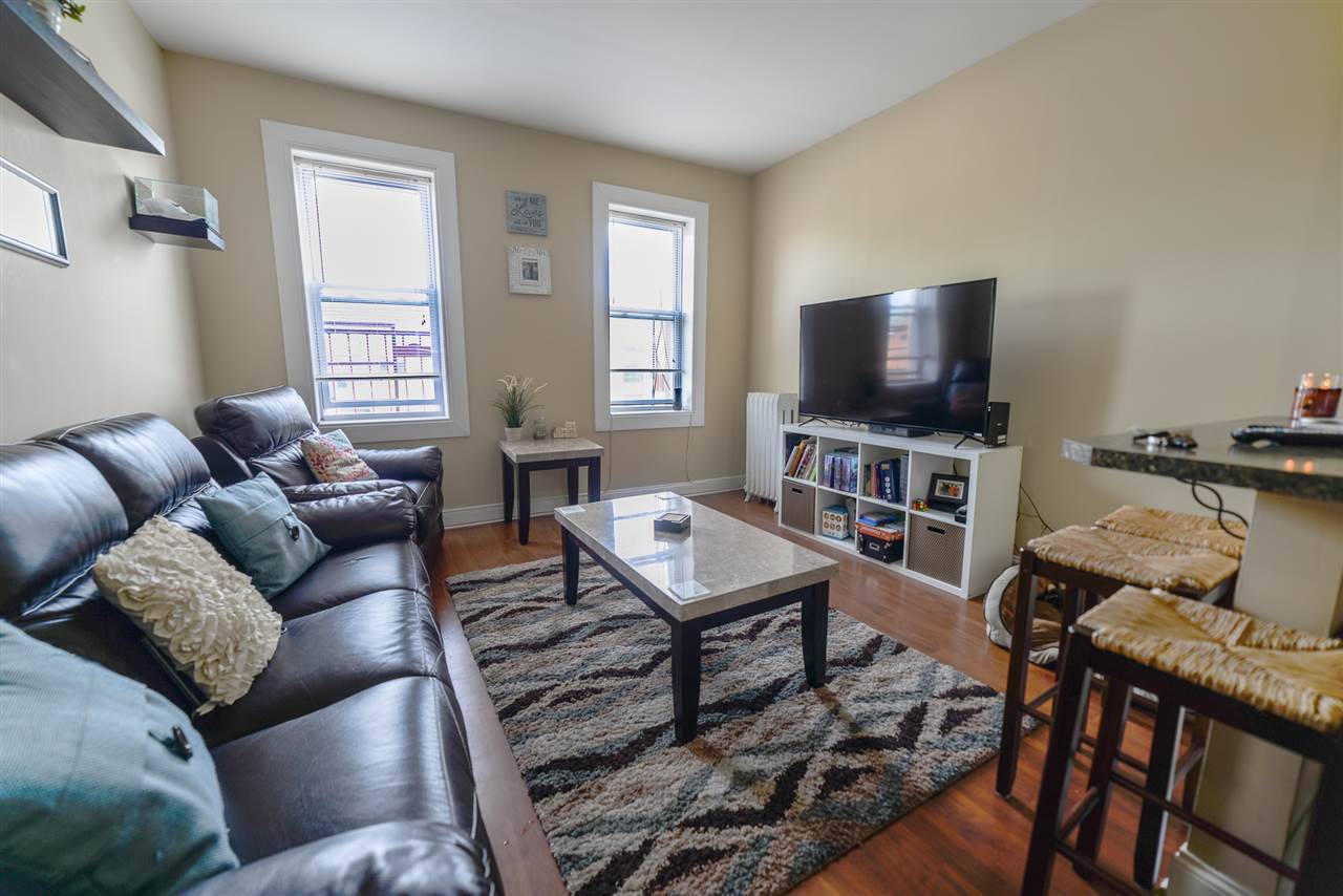 This cheerful two bedroom/one bathroom home is located on the cliff in Weehawken