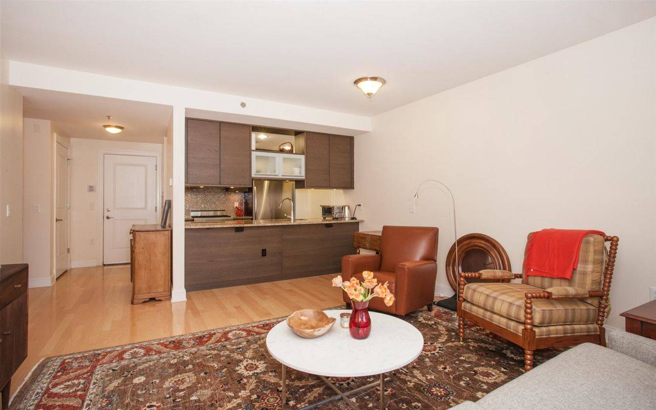 Spacious one bedroom condo with open living area available in Liberty Harbor's The Sutton