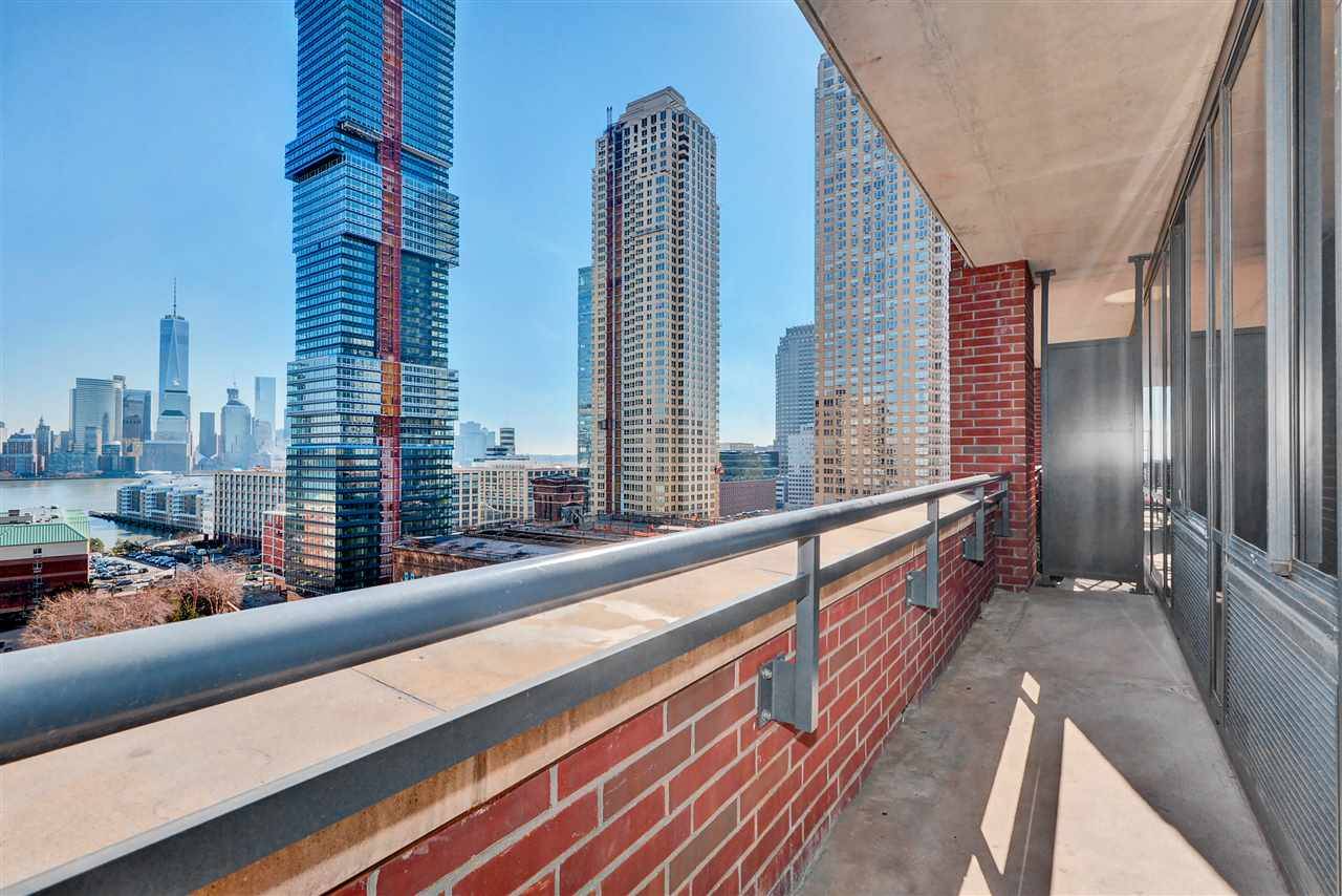 Enjoy spectacular NYC views from this east-facing fabulous 1 bedroom/1 bath premium condo at the A (Athena) building