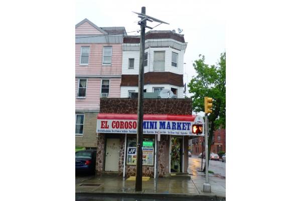 Mixed-use corner property consisting of 2 2-br apartments and 1 store
