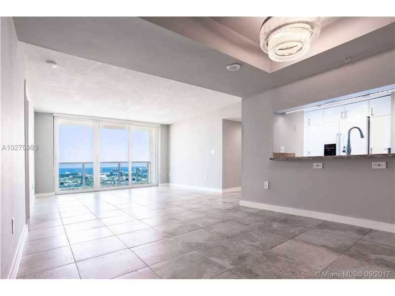 Remodeled high floor 3 bedroom/2 bath apt at The Floridian with expansive ocean & Miami Beach views
