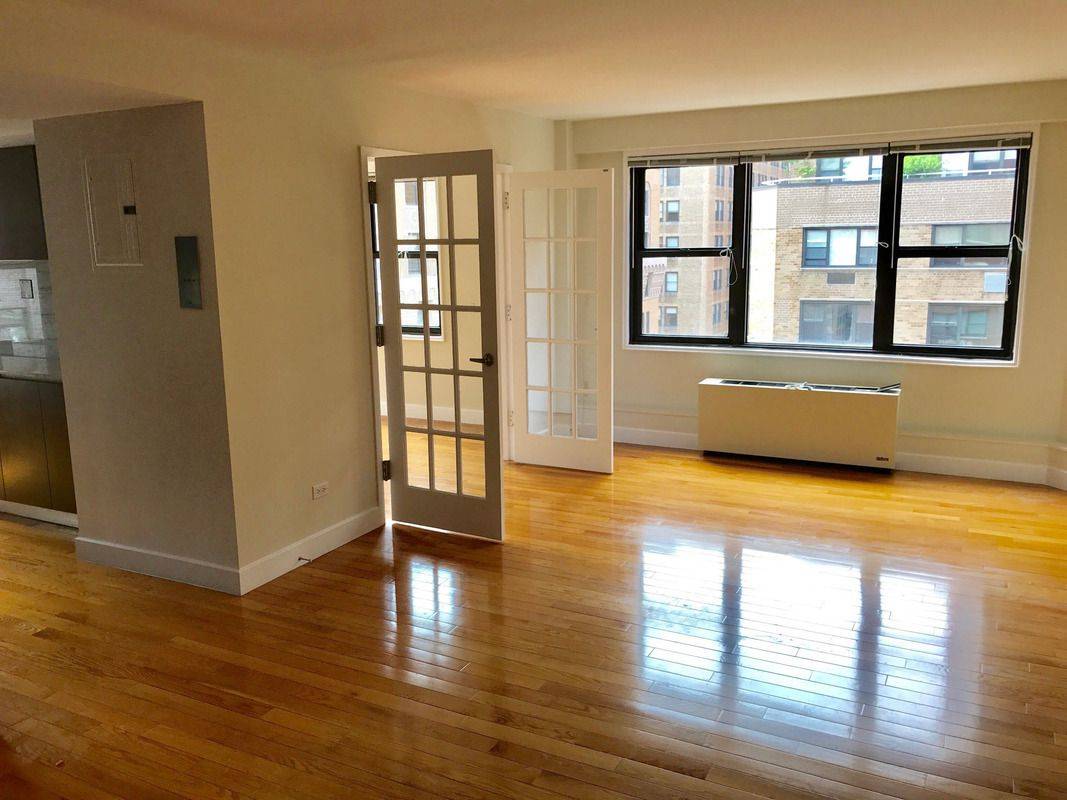 Massive 1 Bedroom/Flex 2 in Luxury Building in Murray Hill with Roof Deck and Private Balcony
