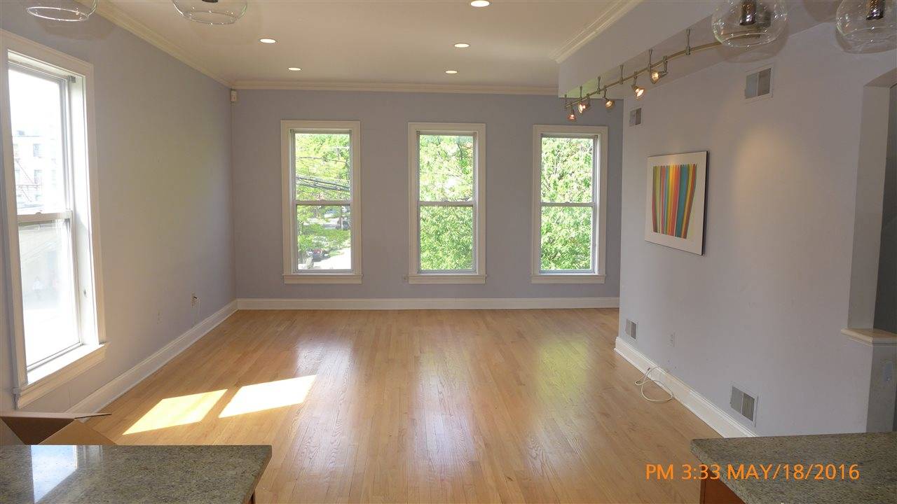 A spacious and completely remodeled (6 years ago) 3BR/3FB duplex on a prestigious Sussex st