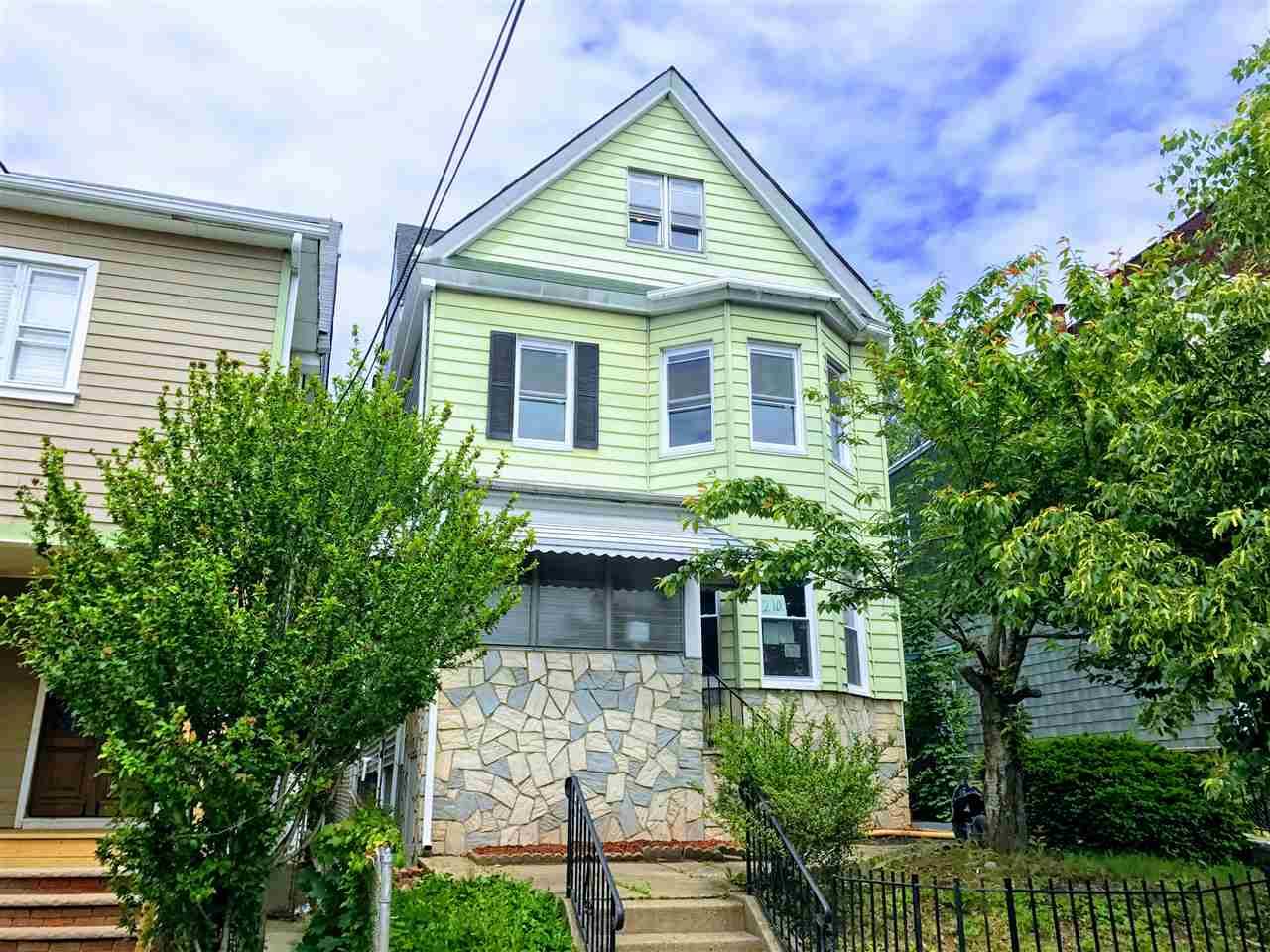 Tastefully renovated early 20th century 5 bedroom Victorian located in the West Bergen-East Lincoln Park Historic District of Jersey City