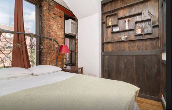 East Village: Converted 3 Bedroom with Exposed Brick on 14th St