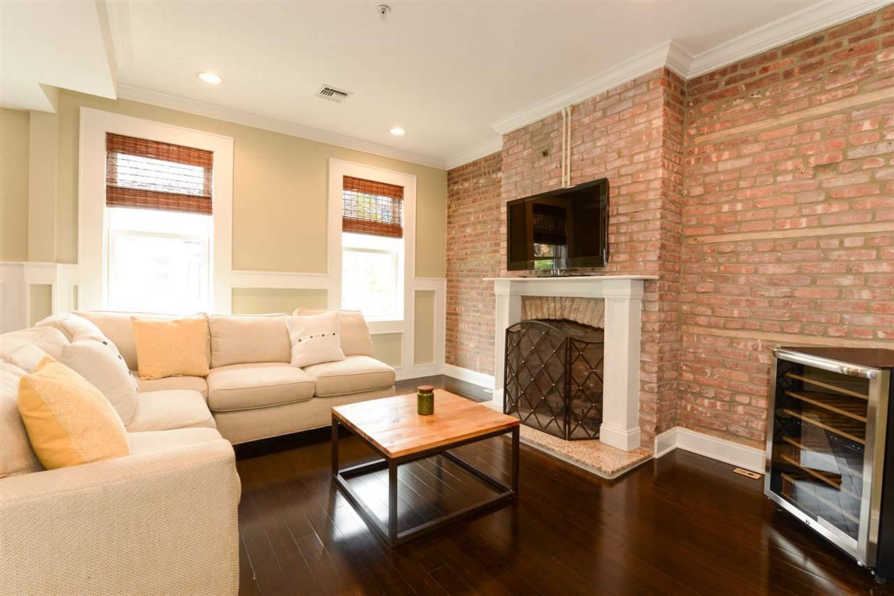 Live on one of Hoboken's most sought-after tree-lined blocks