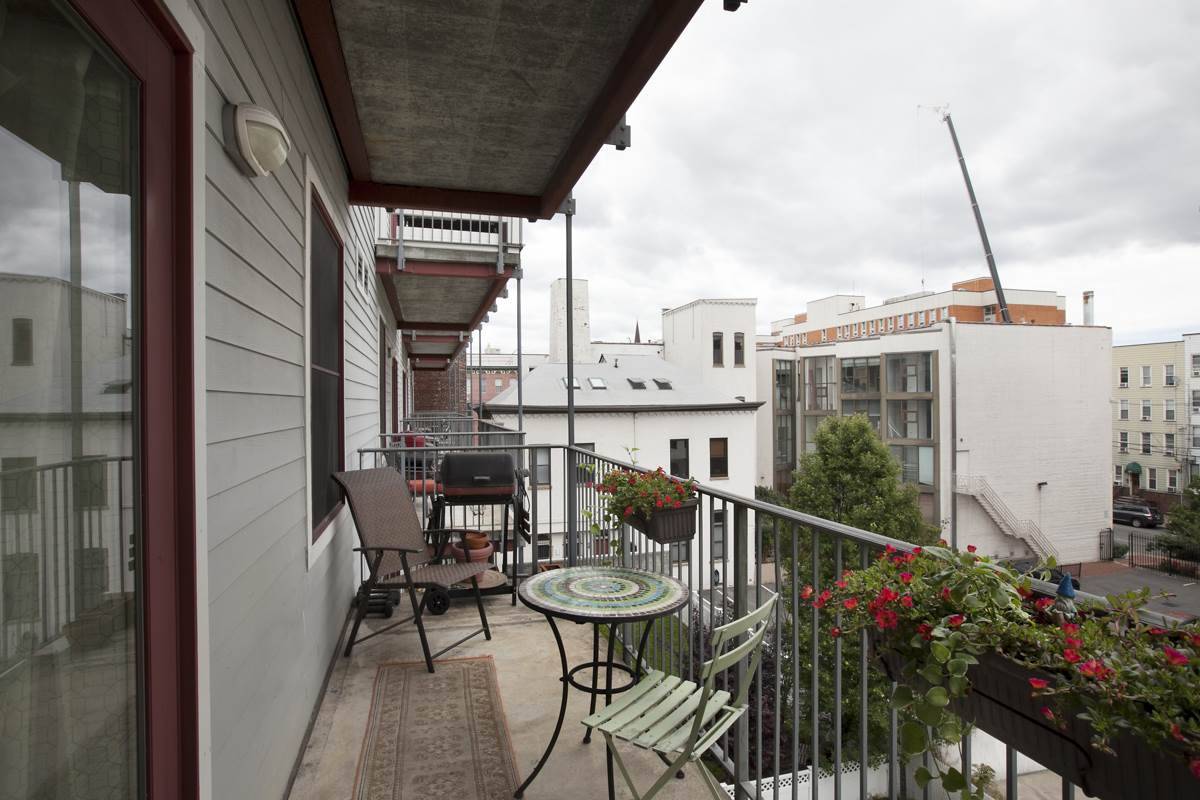 Bright & Spacious 2BR/2BA with private terrace overlooking large common yard in newer elevator building