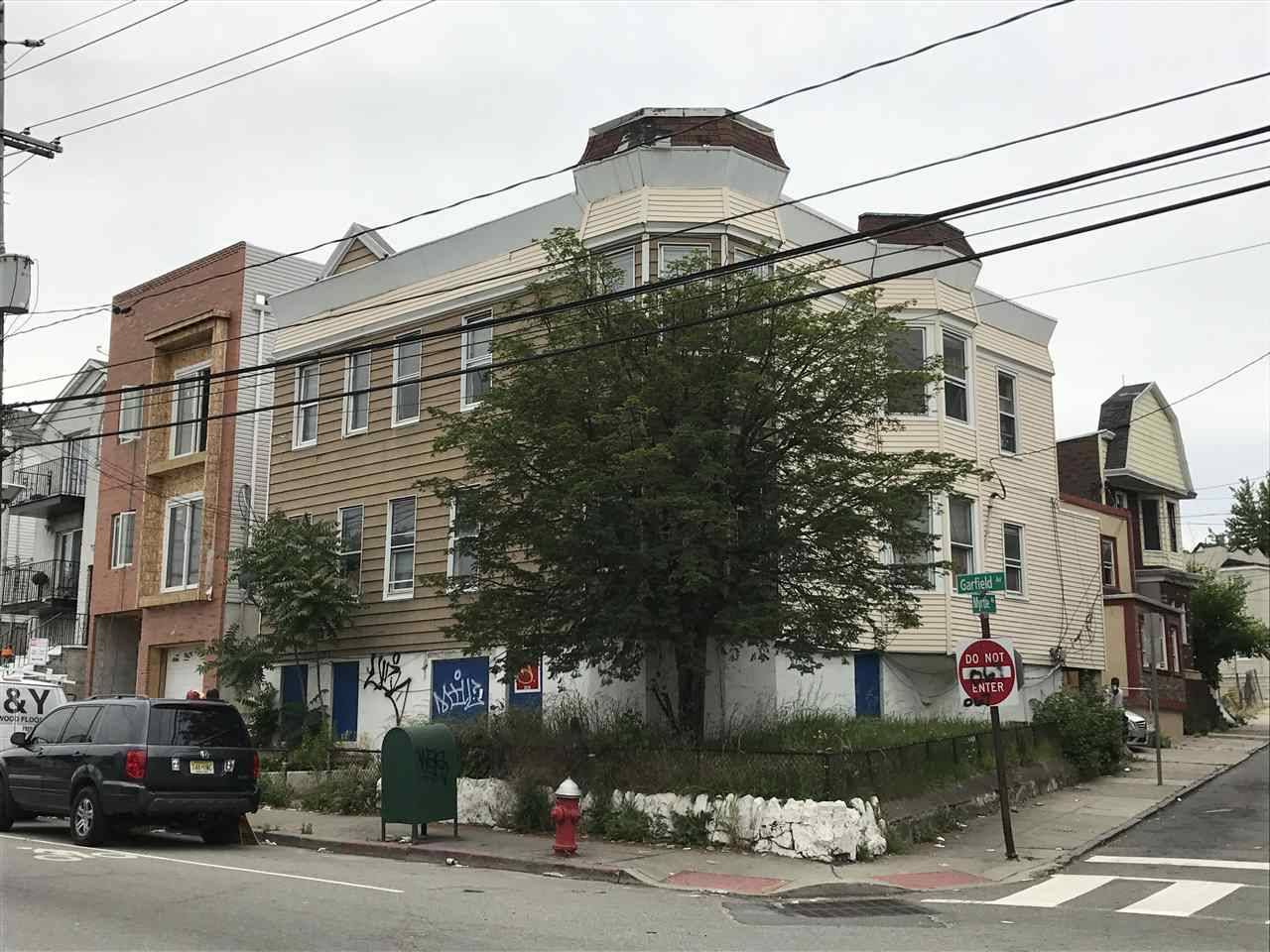 Investment opportunity to own a five unit corner building within walking distant to the Garfield Light Rail Station