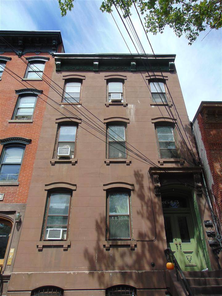 Beautiful 3 family brownstone for sale in Downtown Jersey City
