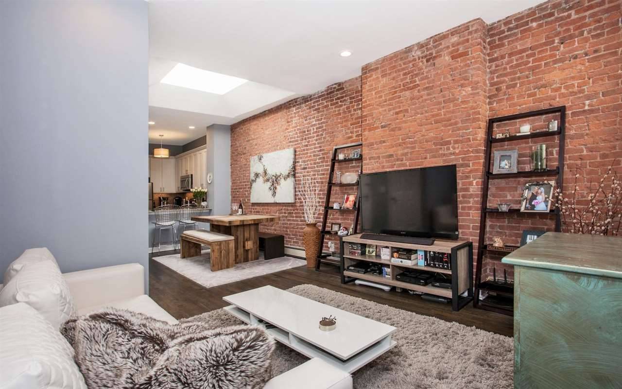 Welcome home to this beautiful 2 bed/1 bath condo in desirable uptown Hoboken