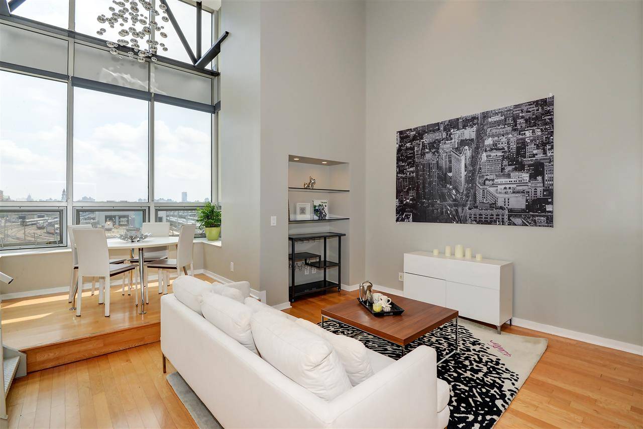 Own the most stunning loft in Soho West: Apt 507 aka the Glass Loft at Zephyr Lofts