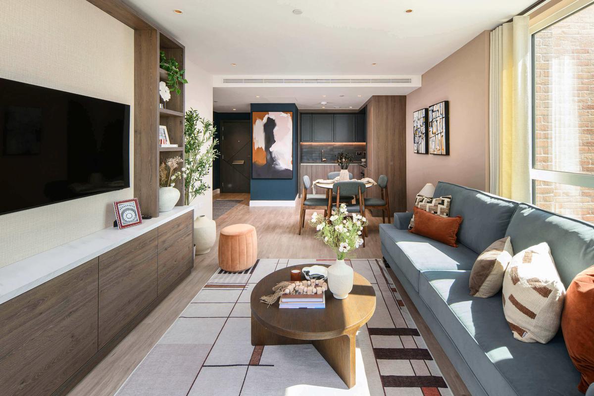The Pinnacle show apartment living / dining room with floor-to-ceiling windows, Oval Village London