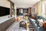 The Pinnacle show apartment living / dining room with floor-to-ceiling windows, Oval Village London