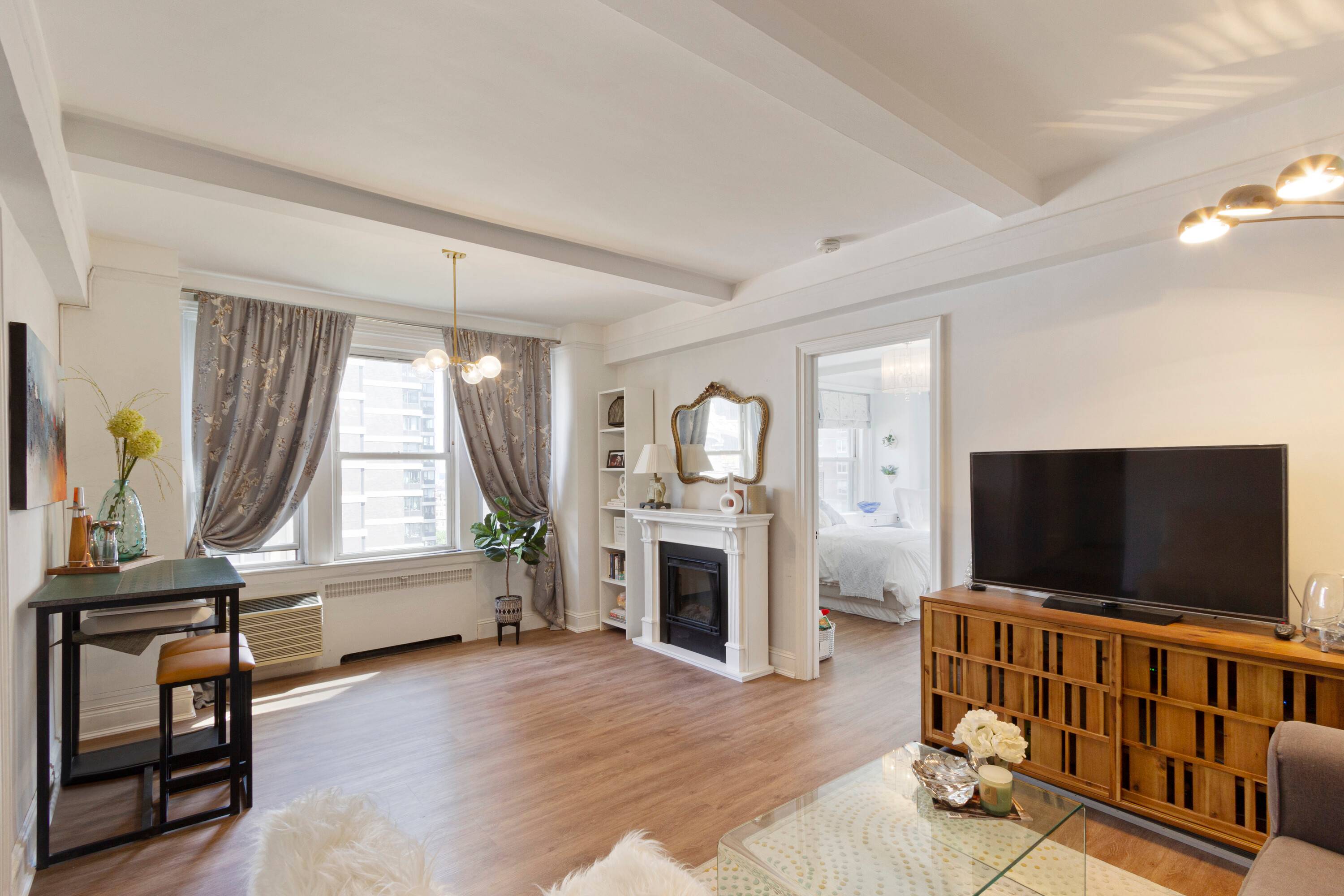Sun filled 1 bedroom, one bath corner  home perched on the 9th floor of a lovely pre war building in Sutton Place