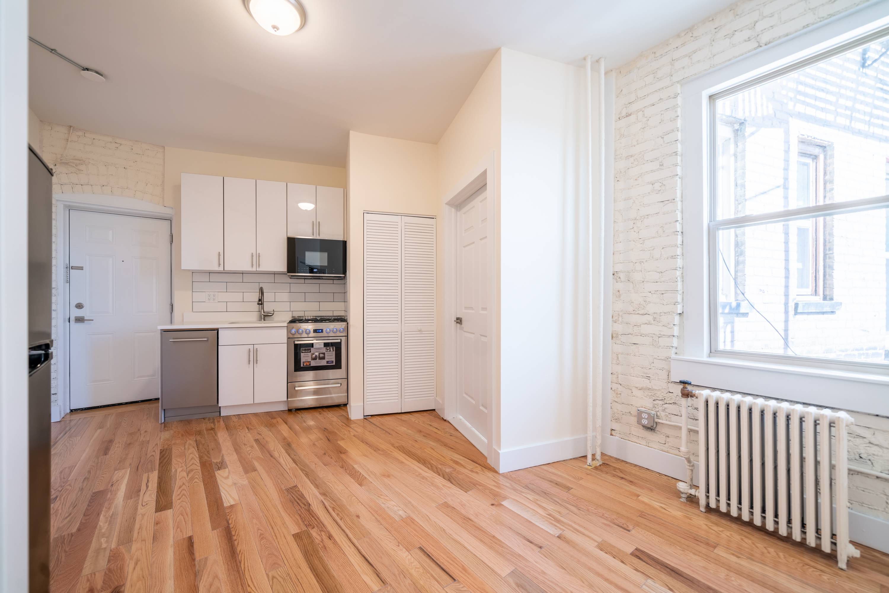 Studio - Stunning Renovated Studio in Prime Journal Square Location! Laundry on Site, Seconds to the Journal Square Path Transportation Center!