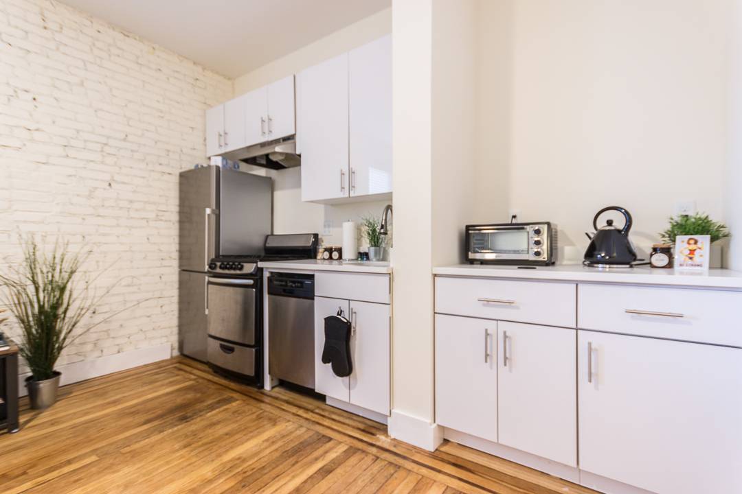 Studio- Stunning Renovated Studio in Prime Journal Square Location!  Laundry on Site, Seconds to the Journal Square Path Transportation Center!
