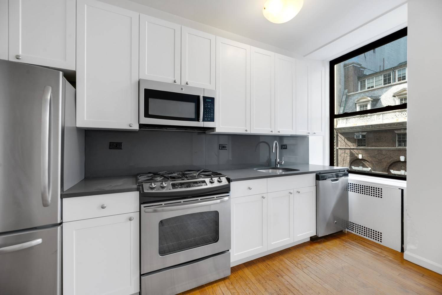 Spacious 2 Bed on Madison Avenue w/ Fireplace, Steps from Madison Square Park