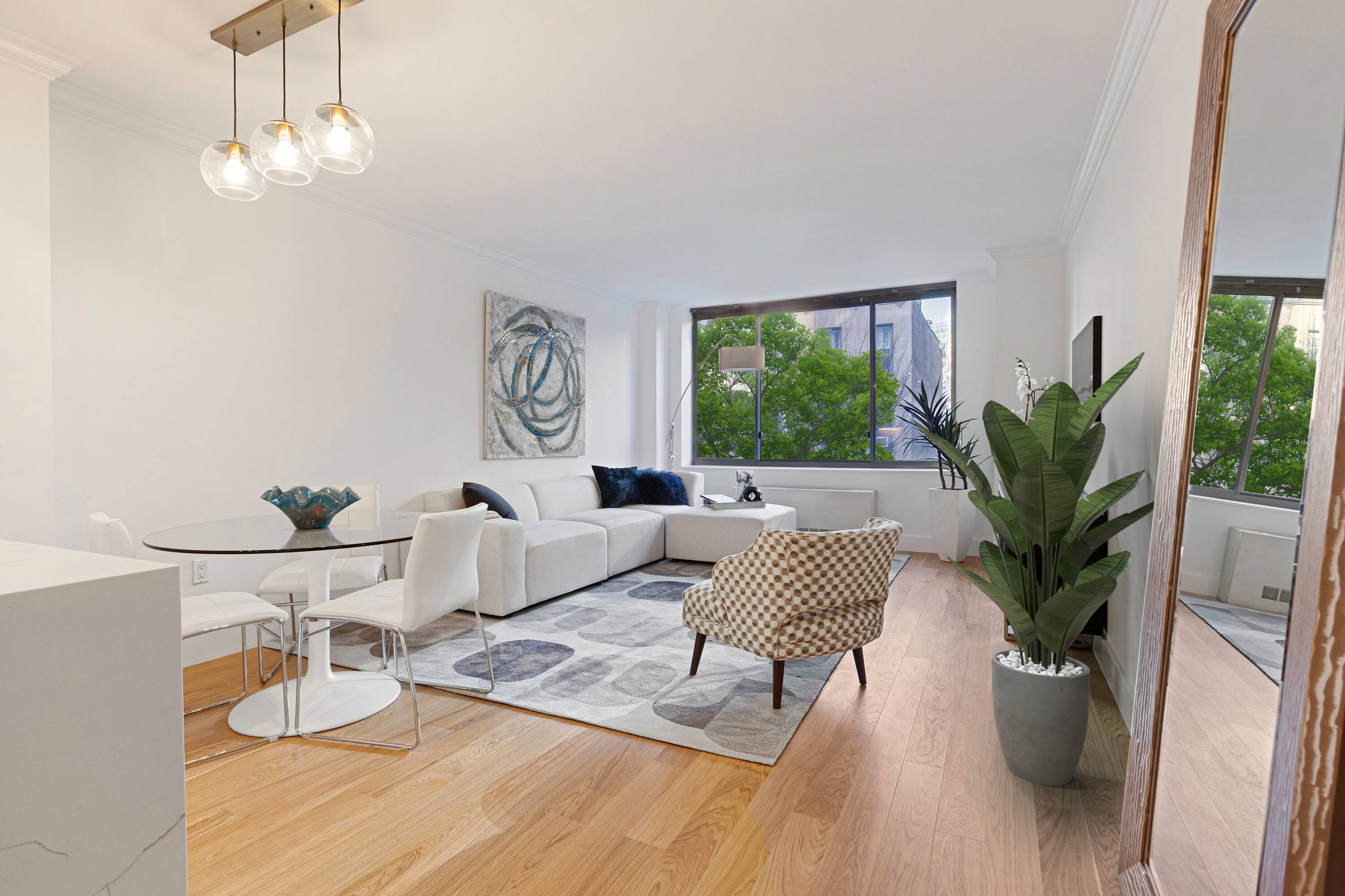 Impeccably renovated one bedroom condo with tree lined views in a white glove condominium on the UES
