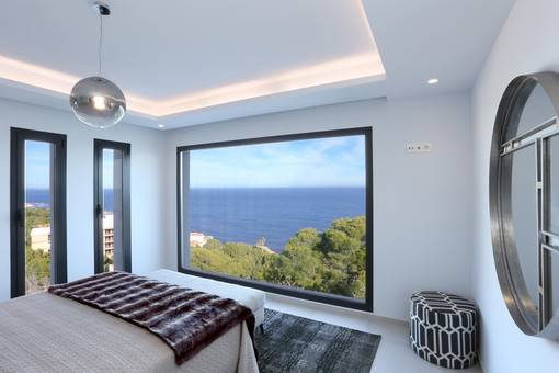 This immaculate villa with stunning sea views and beautifully presented is spread over two levels connected by internal stairs and an elevator.