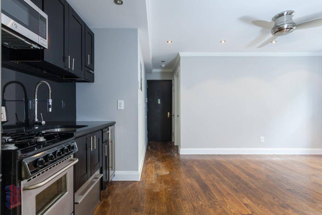 Spacious East Village 1 bedroom 1 bathroom with ample closet space, washer and dryer, stainless & granite kitchen, half month broker fee