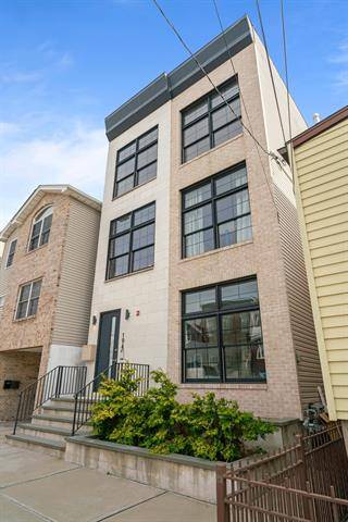 Luxurious 3 Bed 2 Bath Condo with a Private Rooftop in Jersey City Heights Most Desirable Block!
