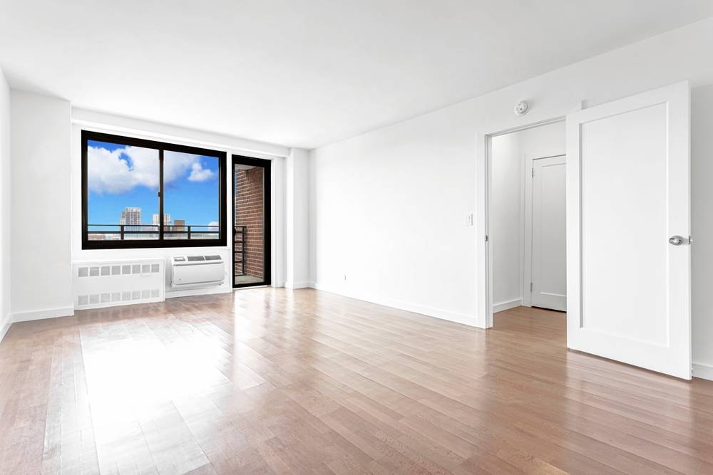 JUST LISTED! Newly renovated Extra LARGE studio in the HEART of UES with 24/HR doorman & dazzling hardwood floors