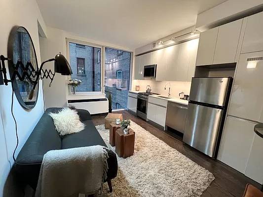 Luxury Alcove Studio in Hudson Square Close to NYU | Central AC | Washer + Dryer | Keyless Entry | Condo-level Fixtures | High Ceilings | Floor to Ceiling Windows