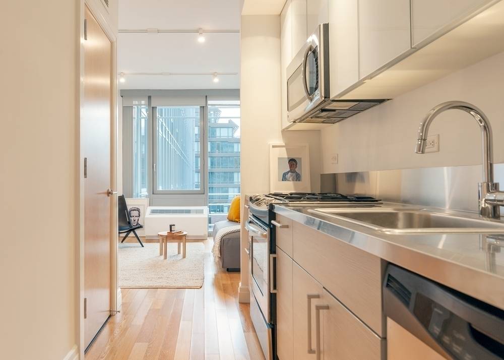 No Fee | Alcove Studio Apartment in Full Service Luxury Building in Hell's Kitchen | Washer/Dryer In-Unit