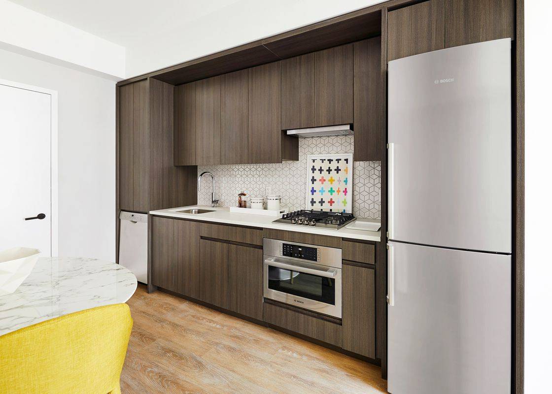 Alcove studio features in unit washer/dryer located in the heart of LIC