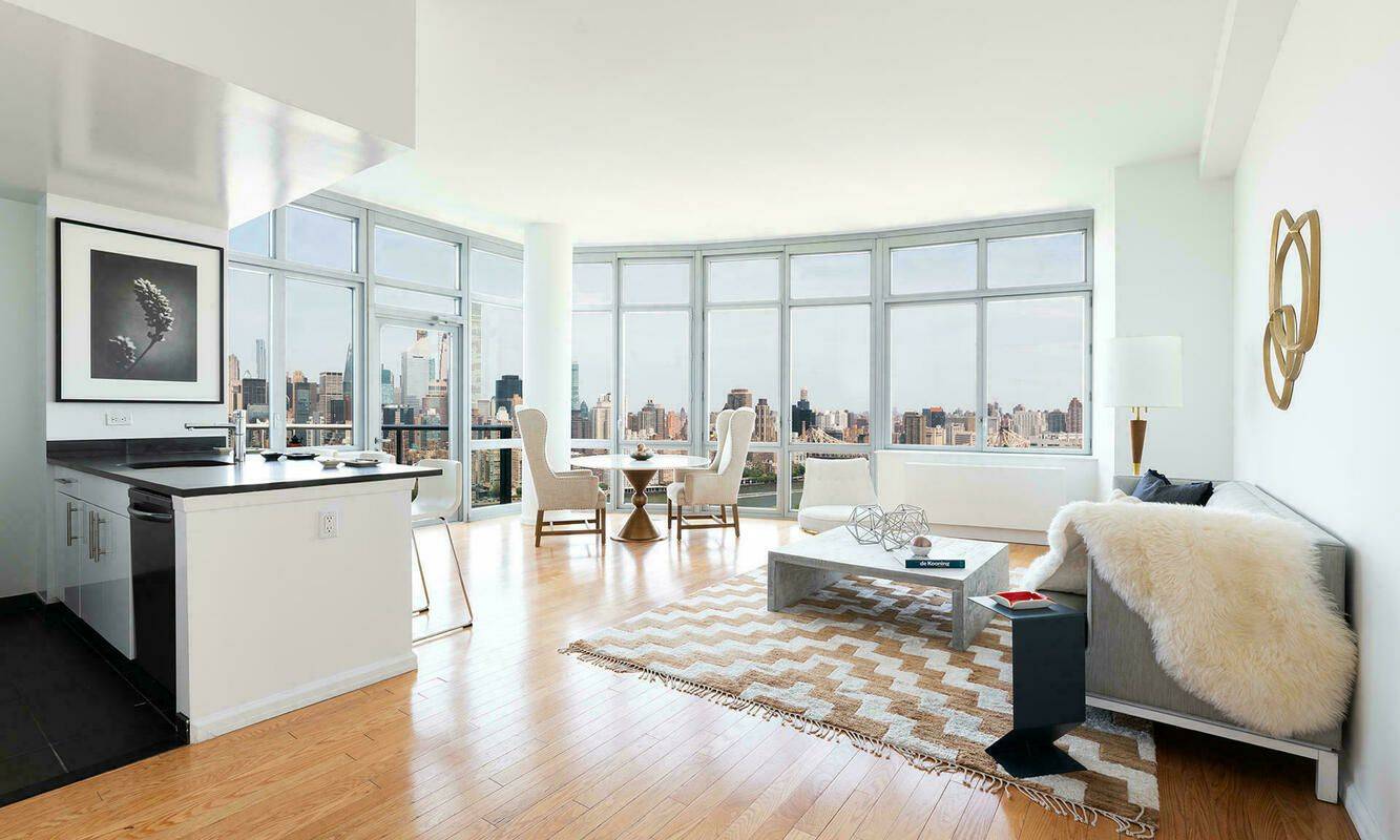 Fantastic 1 Bed/1 Bath in Luxury LIC Building, Closet-Filled Foyer, Elegant Linear Kitchen, Large Living Area, Beautiful North-Facing River Views