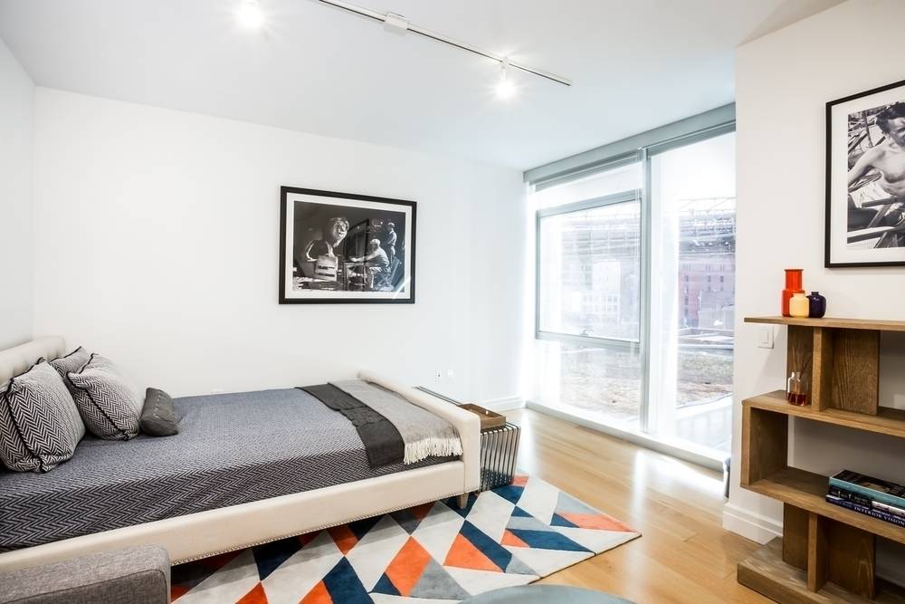 Spacious Dumbo Studio with Floor-to-Ceiling Windows, Walk-in-Closet, Caesarstone Kitchen with Breakfast Bar, W/D, No Fee