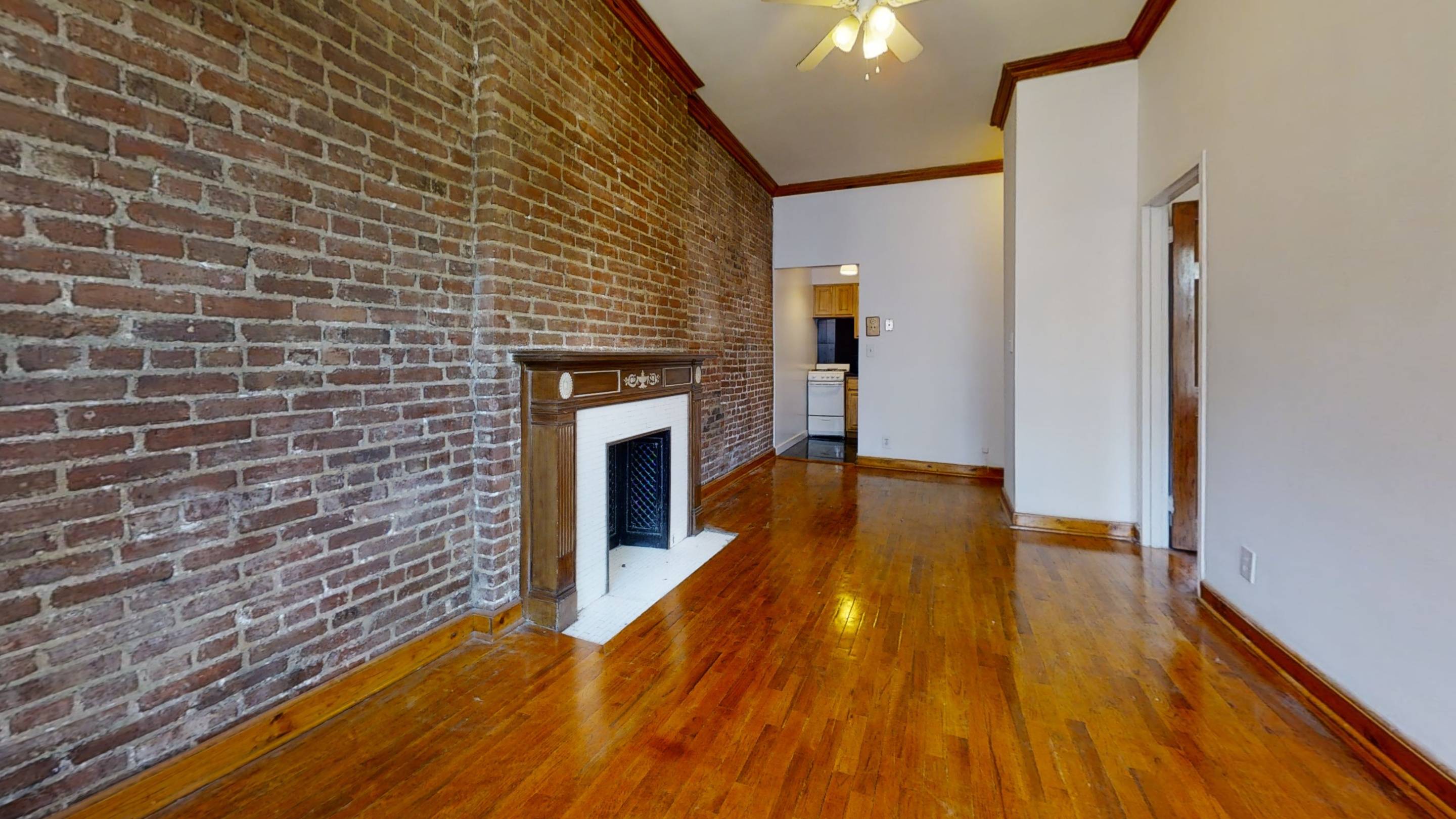 NO FEE | Newly Renovated 1 Bedroom with Exposed Brick Wall, Fireplace and Washer & Dryer | Steps from Central Park