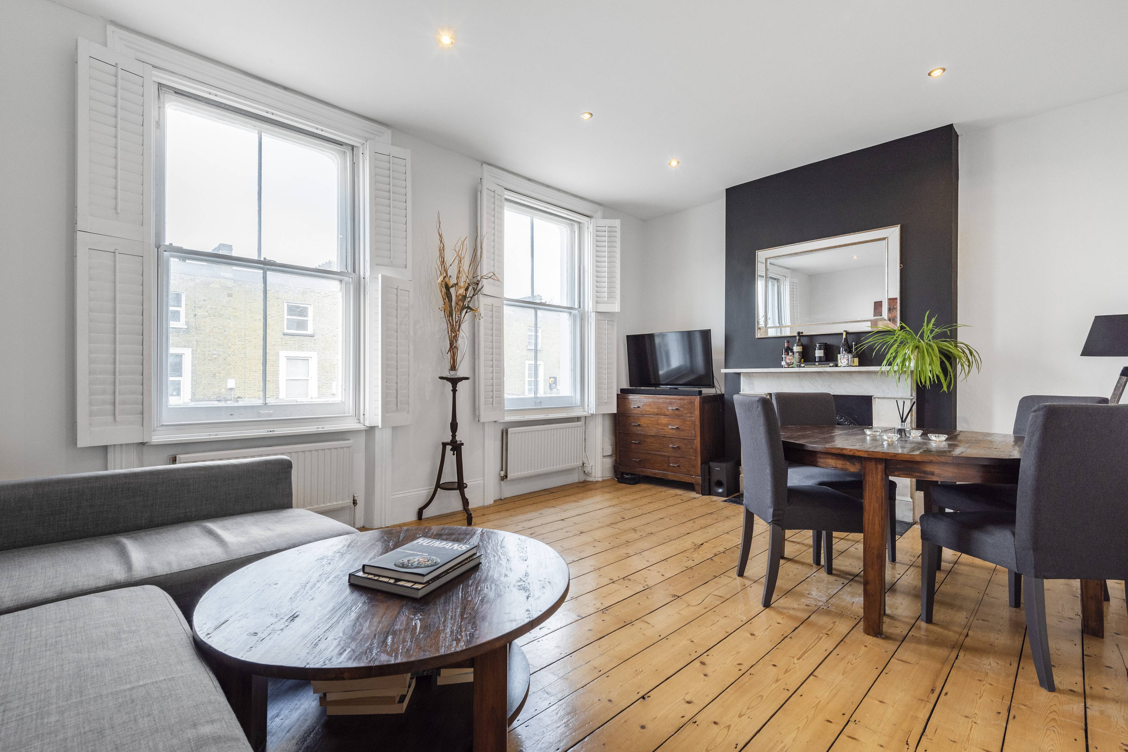 Bright and spacious first-floor apartment in a period property with a fabulous private roof terrace and off-street allocated parking