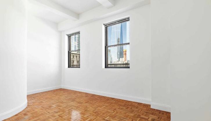 SPACIOUS STUDIO WITH 14 FT LOFTED CEILINGS IN HISTORIC FINANCIAL DISTRICT BUILDING