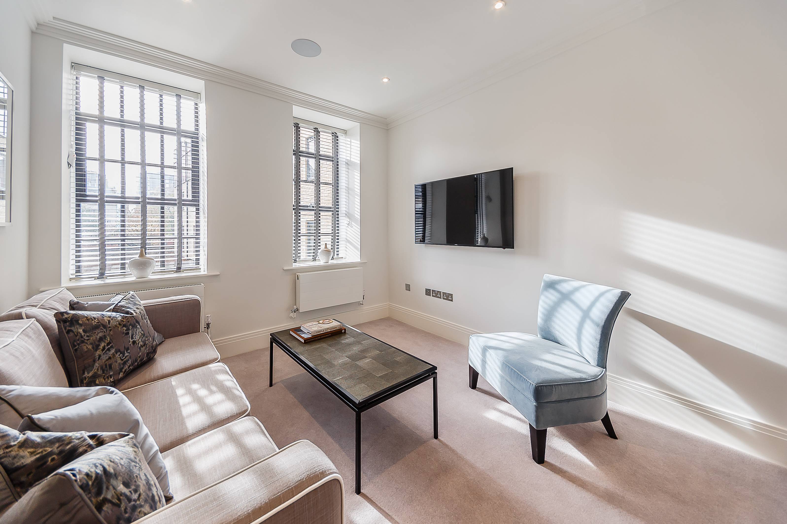 A stunning brand-new interior designed, two-bedroom, two bathroom first-floor apartment facing the courtyard set within this newly converted warehouse, gated development on the River Thames.