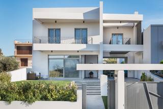 A Seaside two story residence , located in Loutraki, Greece.