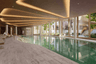 18-metre crescent swimming pool at The 1847 Residents' Club, Oval Village, interior design by Goddard Littlefair