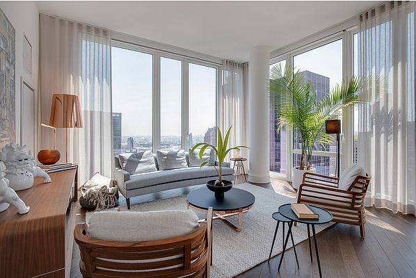 Exceptional 2Bed/2Bath Highrise Unit with Floor to Ceiling Windows, City and Water Views, Washer/Dryer In-Unit, and Stainless Steel Appliances in New Development Building. No Fee!