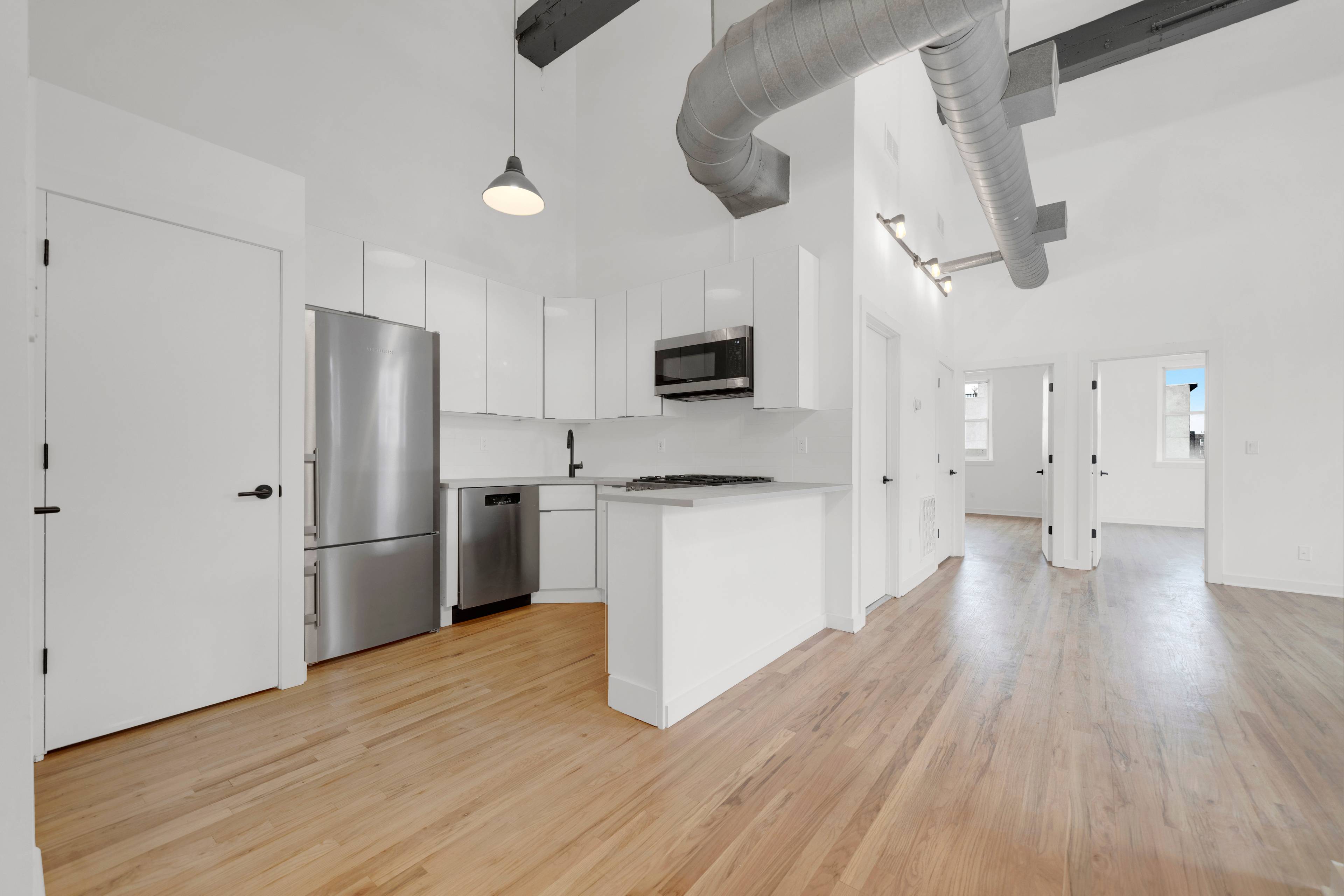 Open 3 Bedroom 2 Bathroom Loft Apartment located in Uptown Hoboken.  Laundry and Central AC In Unit!
