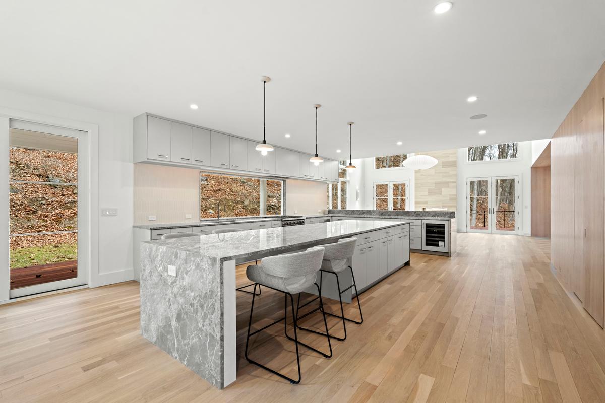Chef's kitchen, kitchen island and pantry first floor