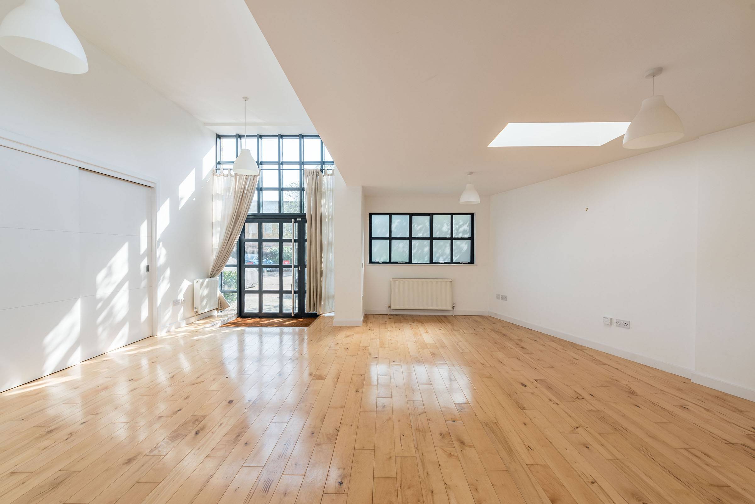 The Carlton Works, a converted former perfume factory loft in Peckham with two bedrooms, massive living area, high ceiling and huge period windows allowing lots of natural light. Perfectly suited for those looking for spacious cool place to live.
