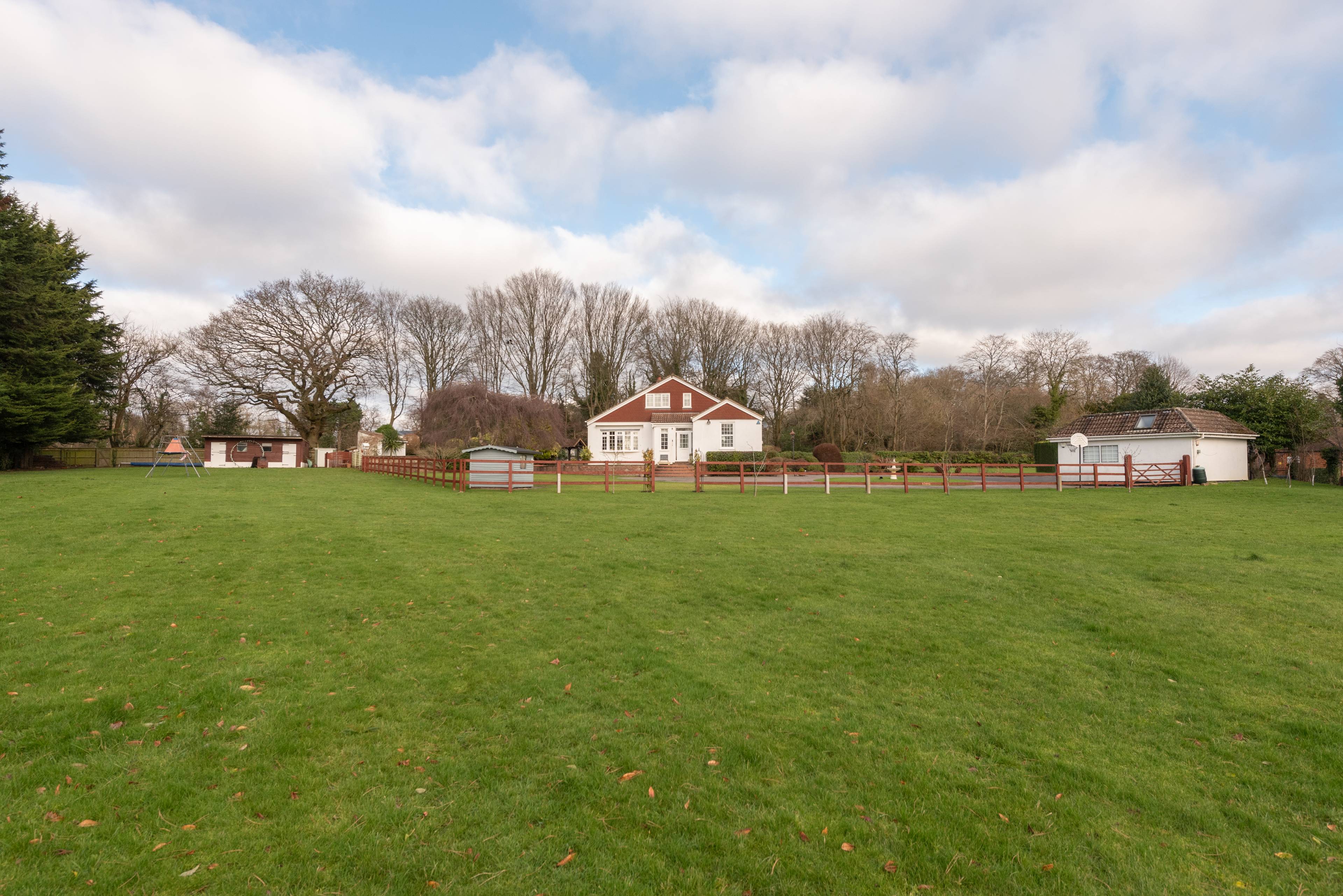 Spacious 6 bedroom family home with swimming pool, paddock and stables set in the idyllic village of Penn, Buckinghamshire. A beautiful home rich with royal connections.
