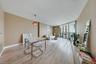 one-miami-east-3110-open-living-dining-room-kitchen-hardwood-floors