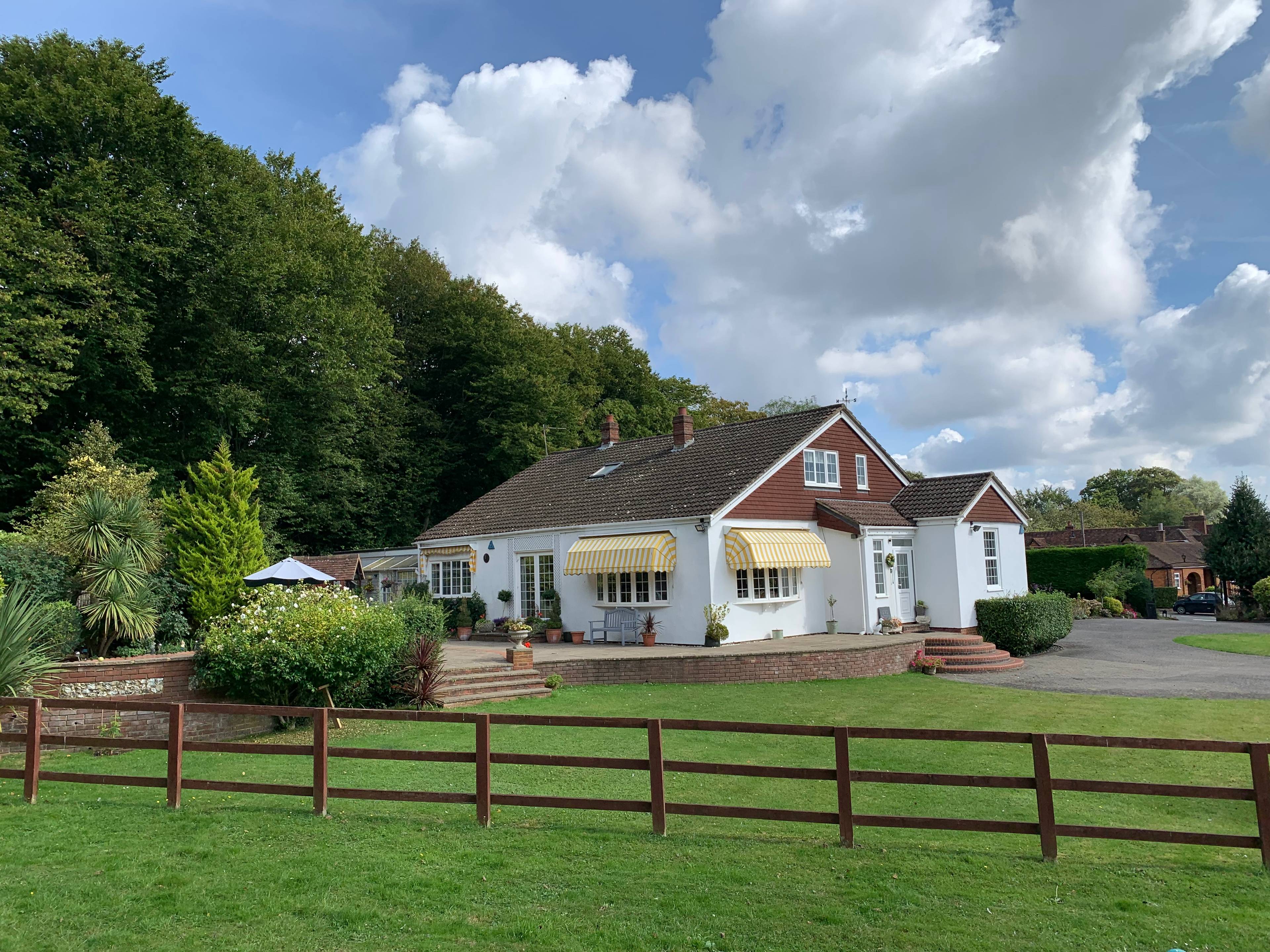 Spacious 6 bedroom family home with swimming pool, paddock and stables set in the idyllic village of Penn, Buckinghamshire. A beautiful home rich with royal connections.