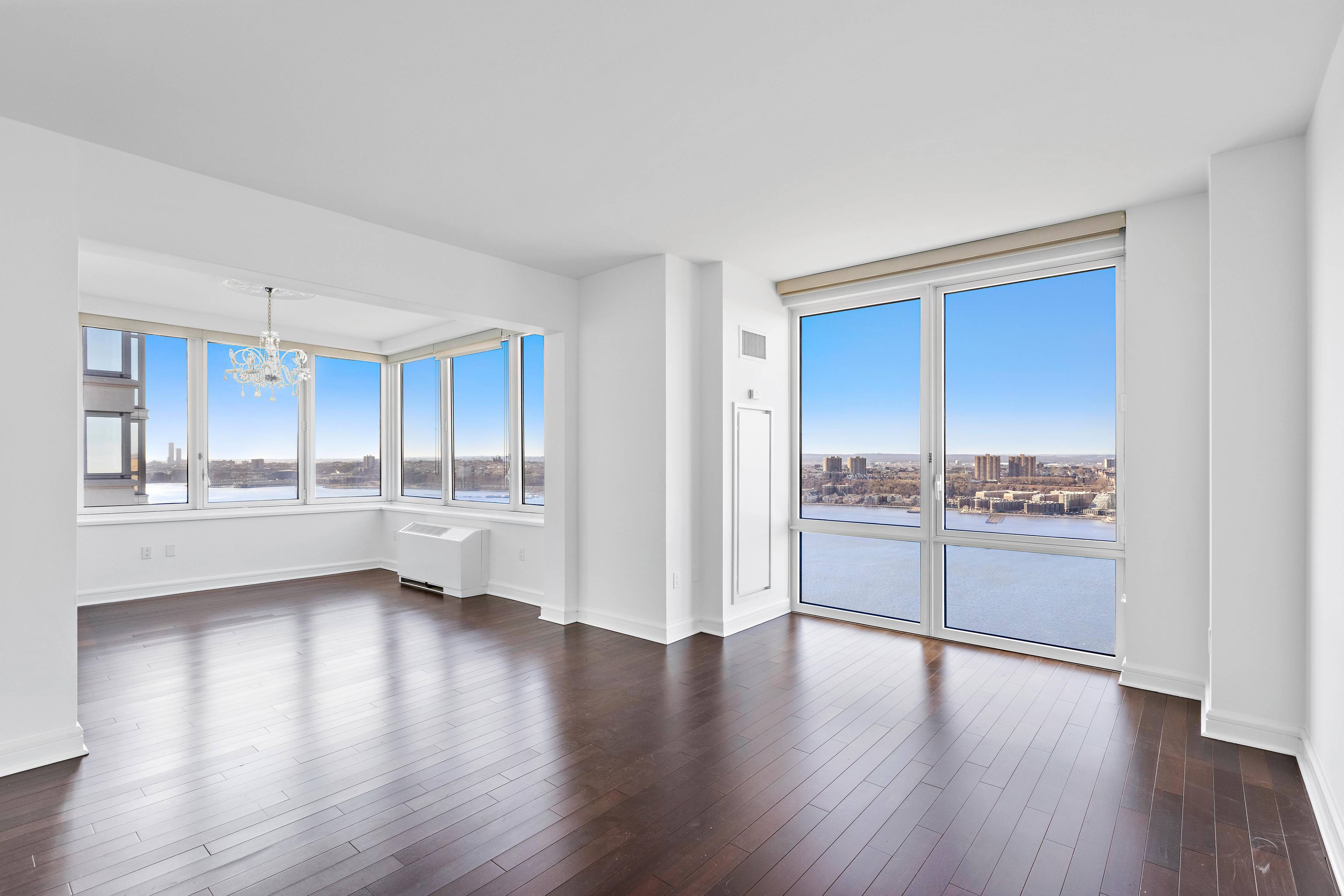 Stunning 3 Bedroom 3 Bathroom Residence with Open Kitchen & fascinating Hudson river & city views!