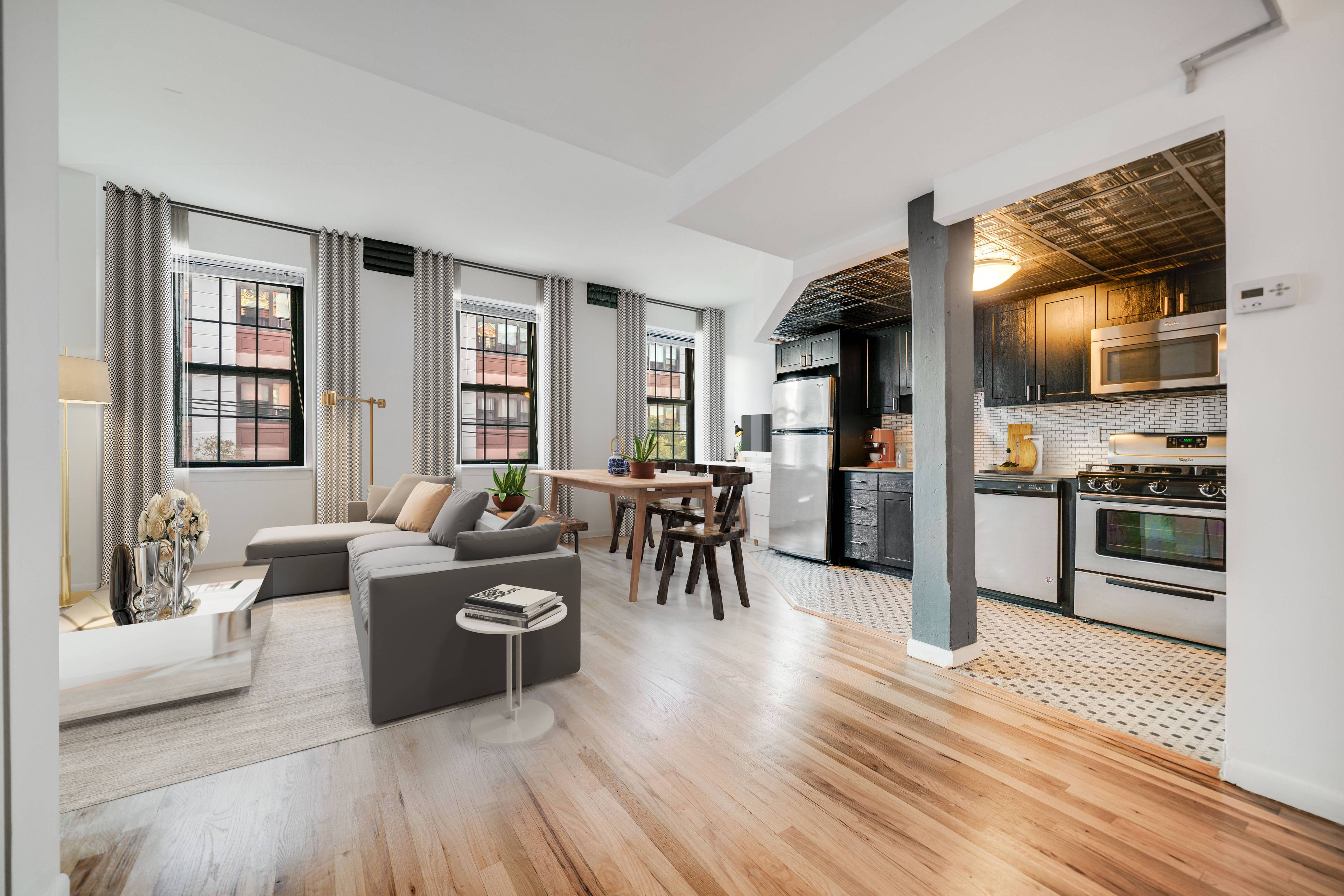 Beautiful Open and Spacious 2 Bedroom 1.5 Bathroom Soho Loft Duplex located at the Grand Adams in Downtown Hoboken! Laundry In Unit! Elevator Building!