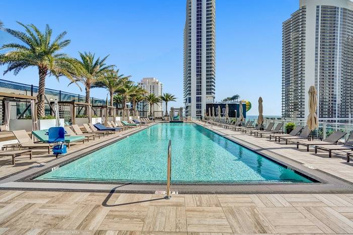 Miami Condo Hotel | Investment ROI 3% | 4 Star Waterfront Hotel | Private Beach | 2 bed 2 bath